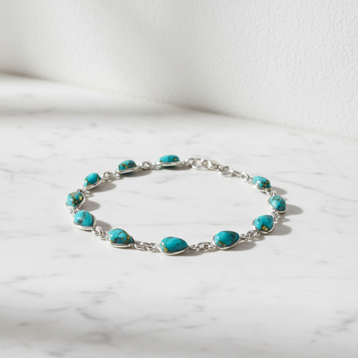Sterling Silver Blue Mohave Turquoise Teardrop Bracelet