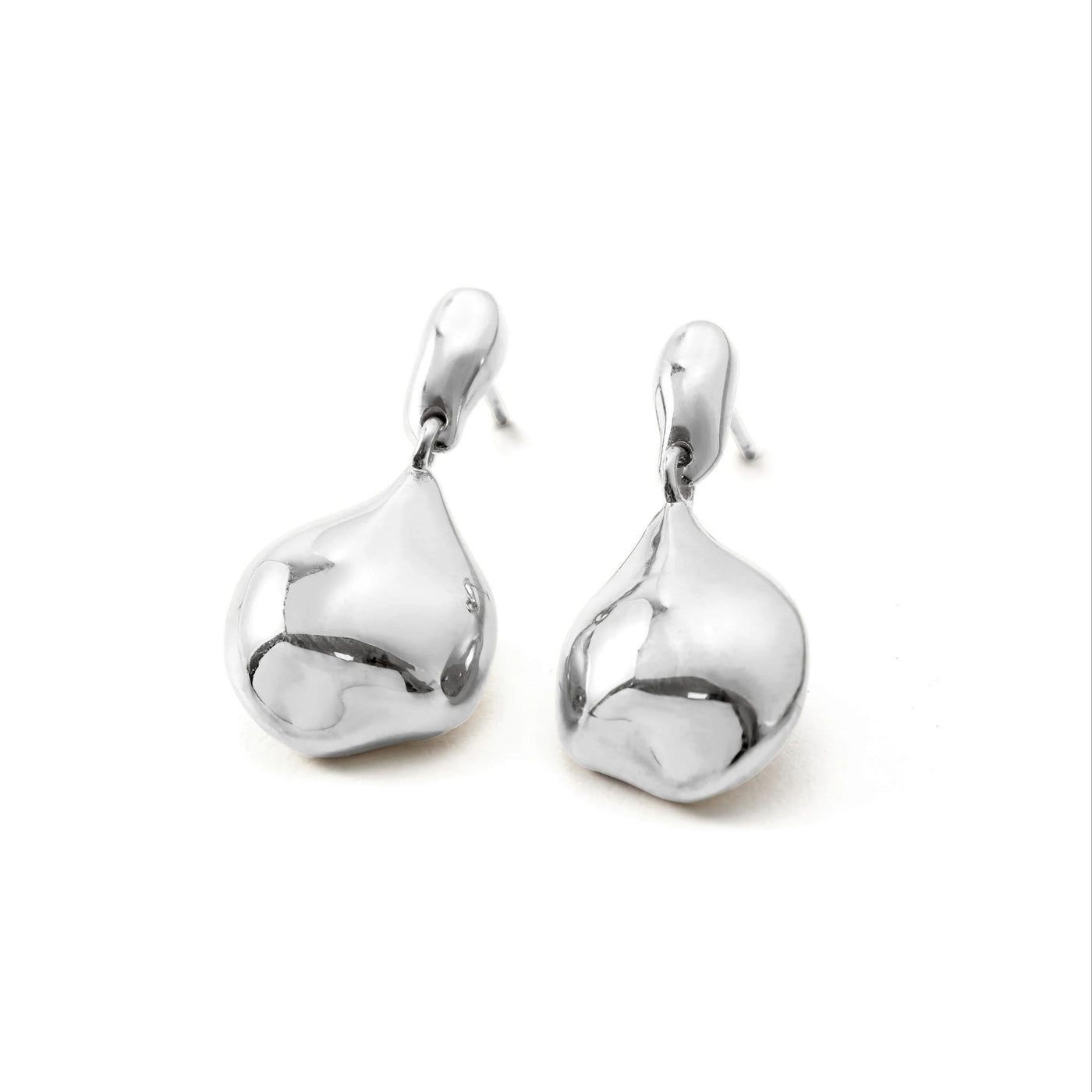 Pair of silver teardrop earrings on a white background