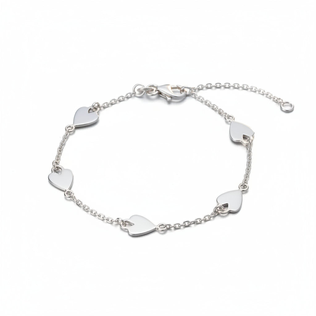 Silver bracelet with heart-shaped links on a white background