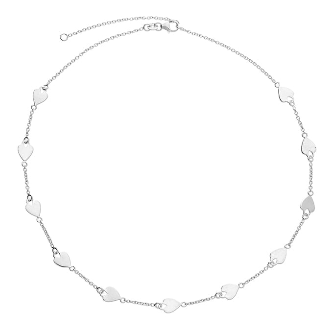 Silver necklace with heart-shaped pendants on a white background