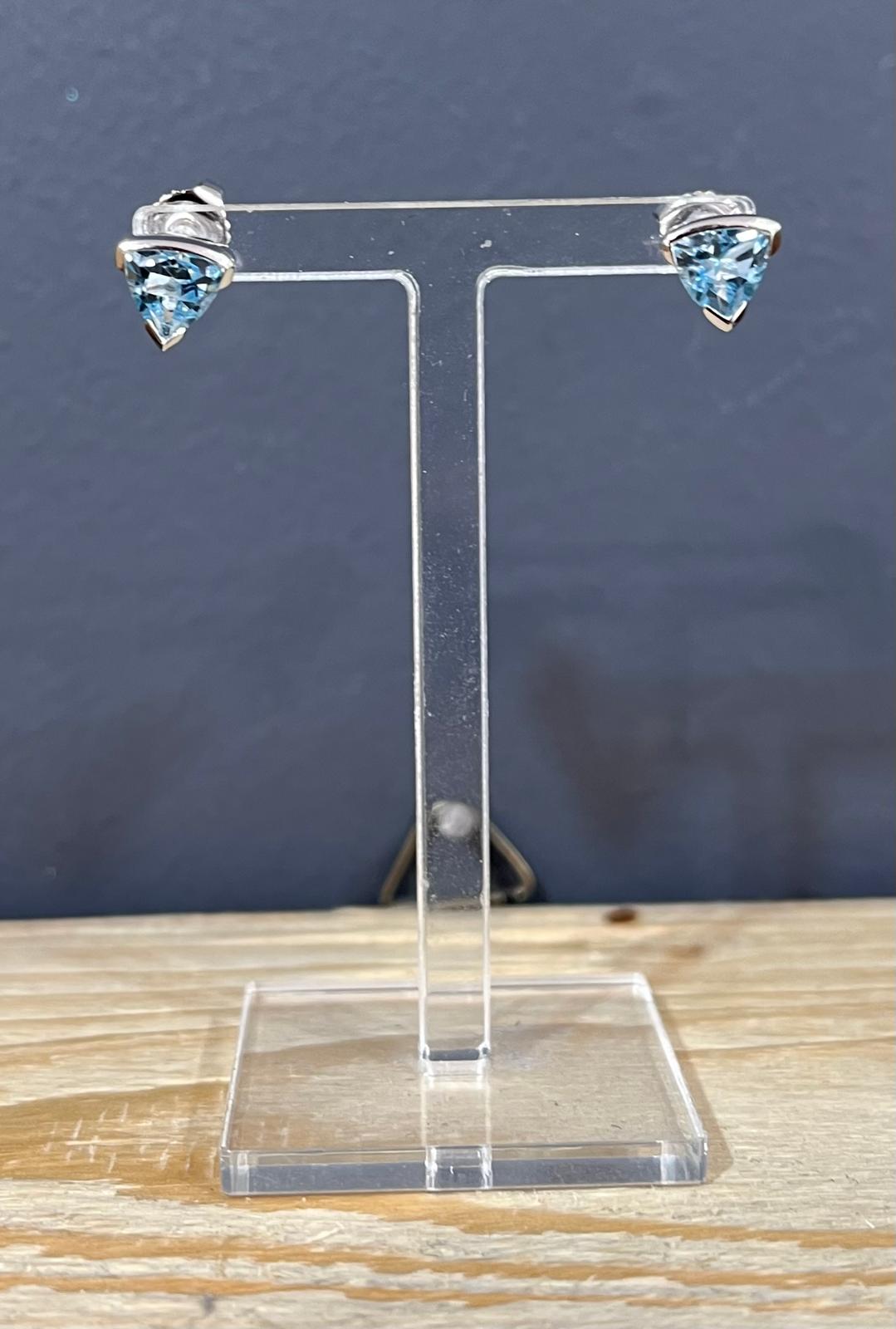Unique & Co Sterling Silver Blue Topaz Stud Earrings