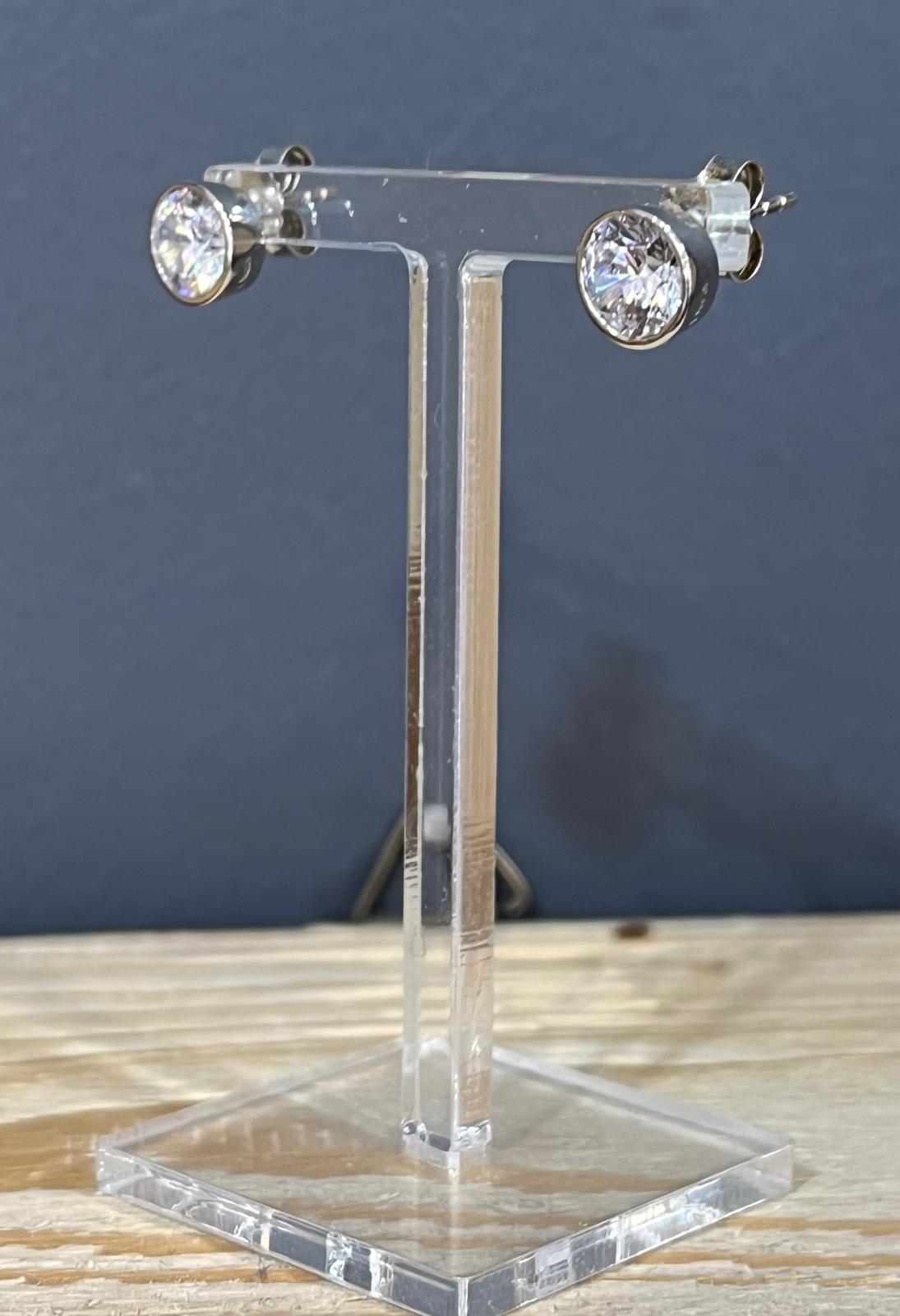Unique & Co Silver Cubic Zirconia Stud Earrings