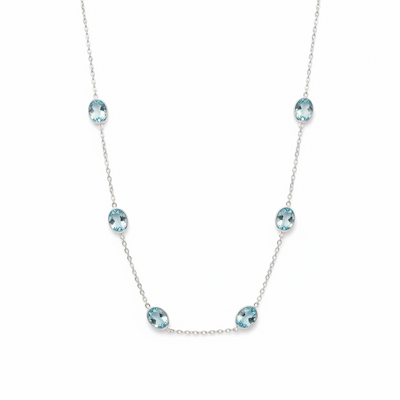 Sterling Silver Bezel-Set Faceted Blue Topaz Necklace