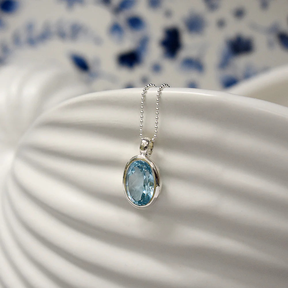 Sterling Silver Blue Topaz Oval Pendant