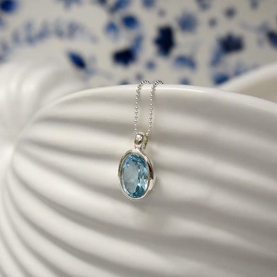 Sterling Silver Blue Topaz Oval Pendant