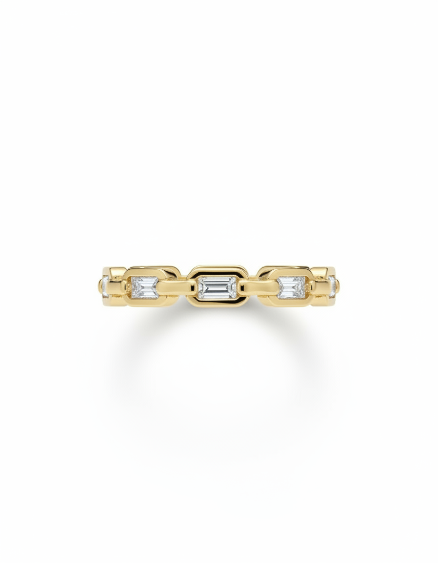 Gold ring with embedded diamonds on a white background