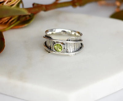 Sterling Silver Peridot Bark Effect Spinning Ring