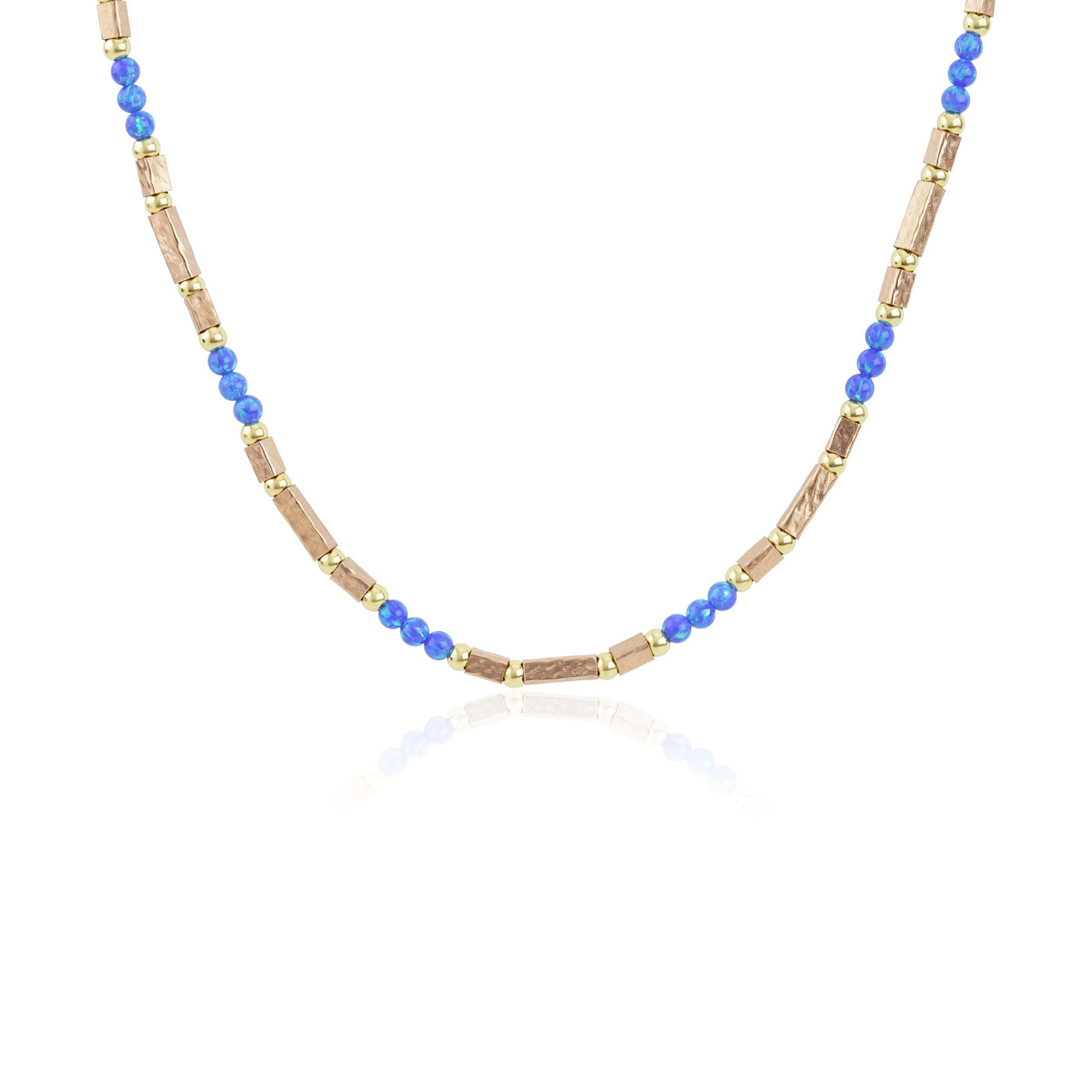 Necklace with blue and rose gold beads on a white background.