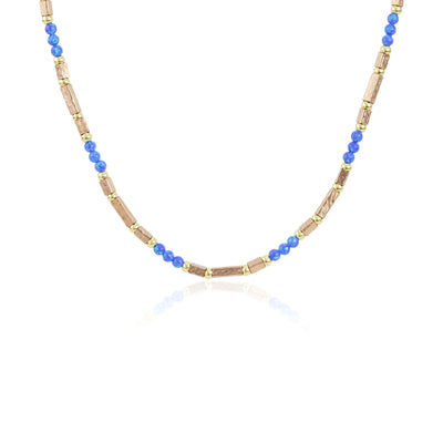 Necklace with blue and rose gold beads on a white background.