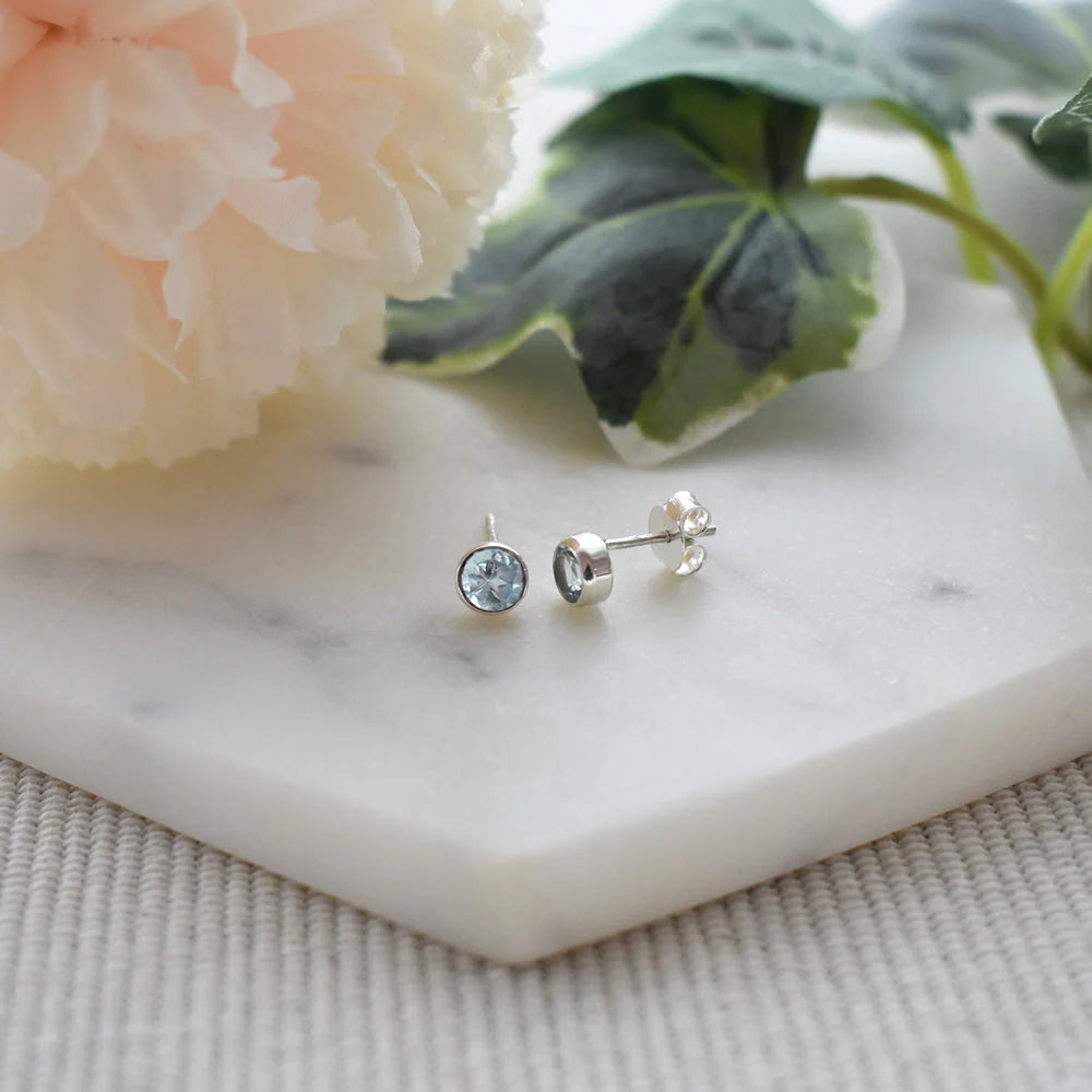 Sterling Silver Blue Topaz Round Stud Earrings