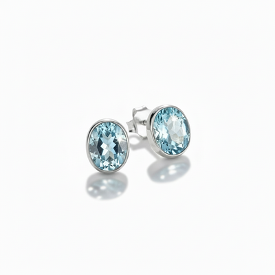 Blue Topaz Faceted Oval Cabochon Stud Earrings