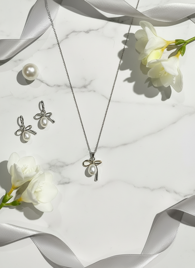 Sterling Silver Rice Pearl Open Bow Pendant Necklace