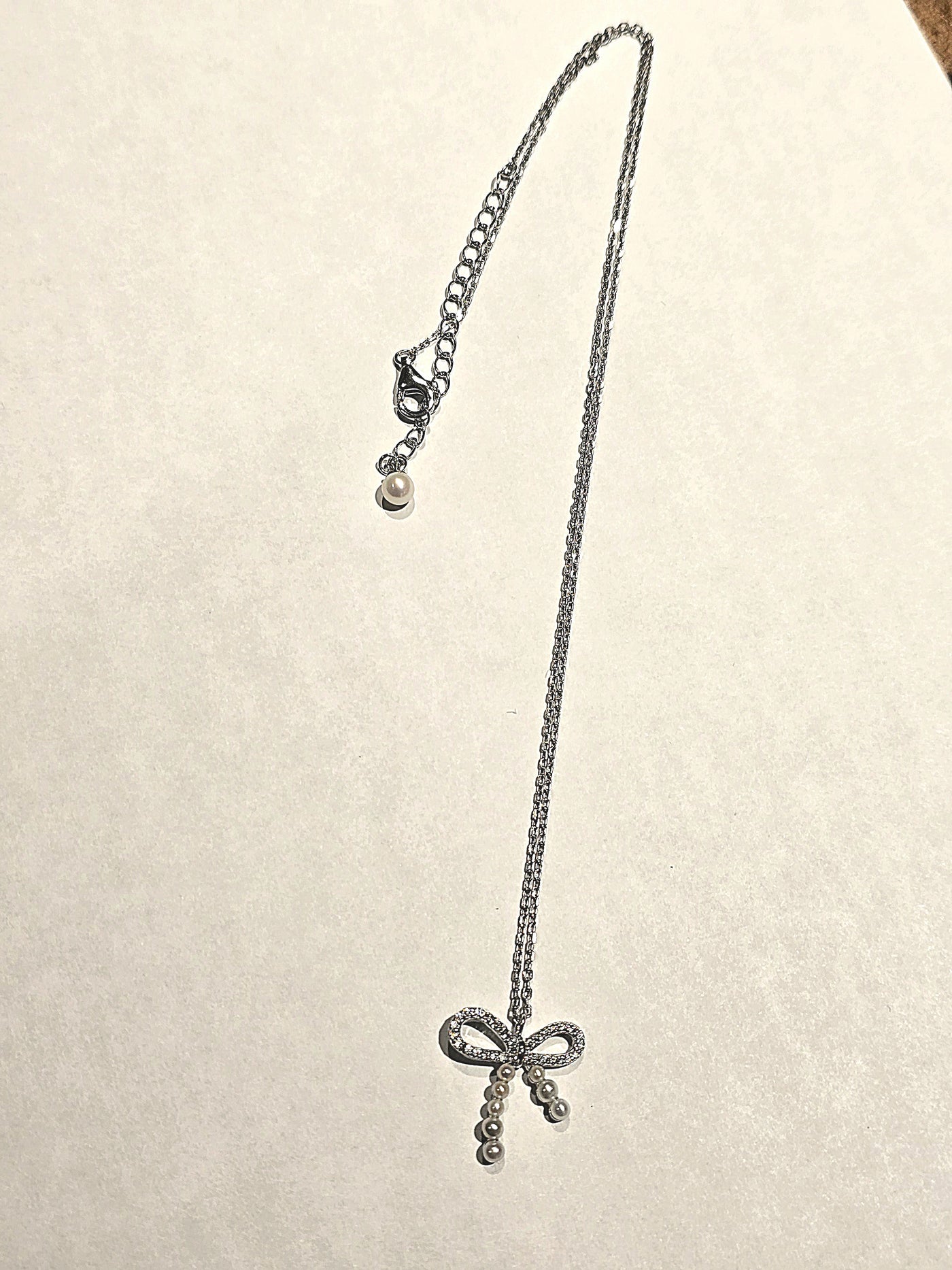 Sterling Silver Pearl Cubic Zirconia Bow Pendant Necklace