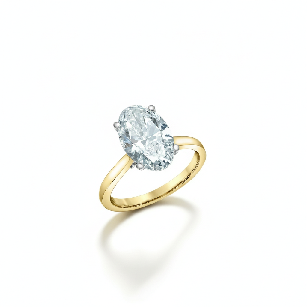 Gold ring with a large diamond on a light background