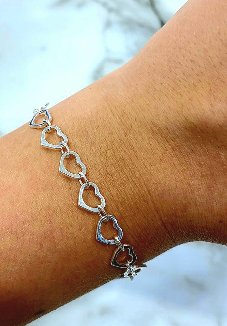 Sterling Silver Row of Outline Hearts Bracelet - Rococo Jewellery