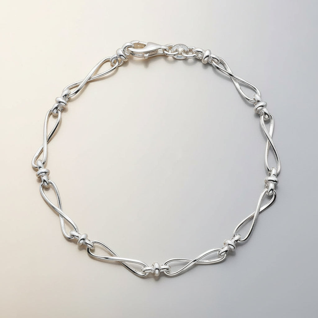 Sterling Silver Row of Infinity Twist Links Bracelet - Rococo Jewellery